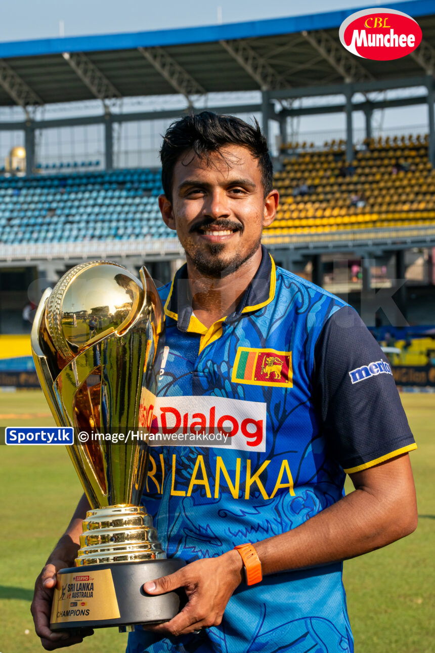 Maheesh Theekshana holds the trophy